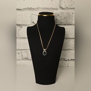 Nina Ricci Vintage Emerald Glass Halo Pendant Necklace Gold-Tone X Design